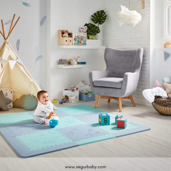 Gris y rosa, los colores de una alfombra para el cuarto del bebe •